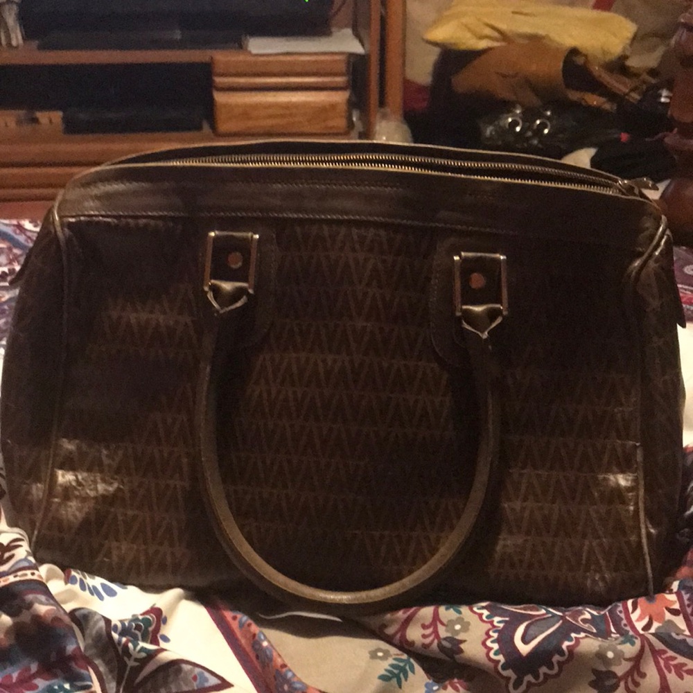 A vintage Mario Valentino. Excellent condition.